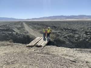 Photo of lake with employees