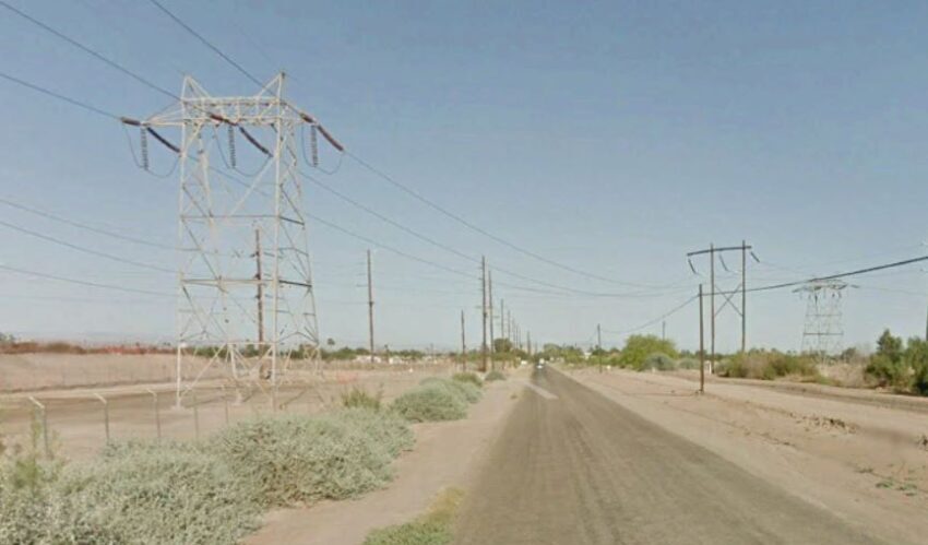 road with electric transmission lines